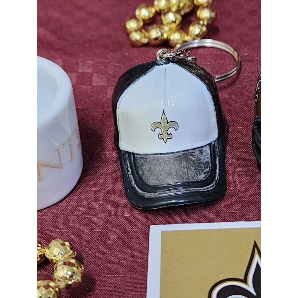 New Orleans Saints Lot Of 16, Stickers, Mini Helmets, Necklaces And Keychain